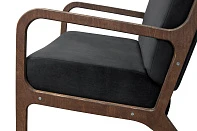 Низкое кресло с деревянными подлокотниками Mody Black черное в интерьере